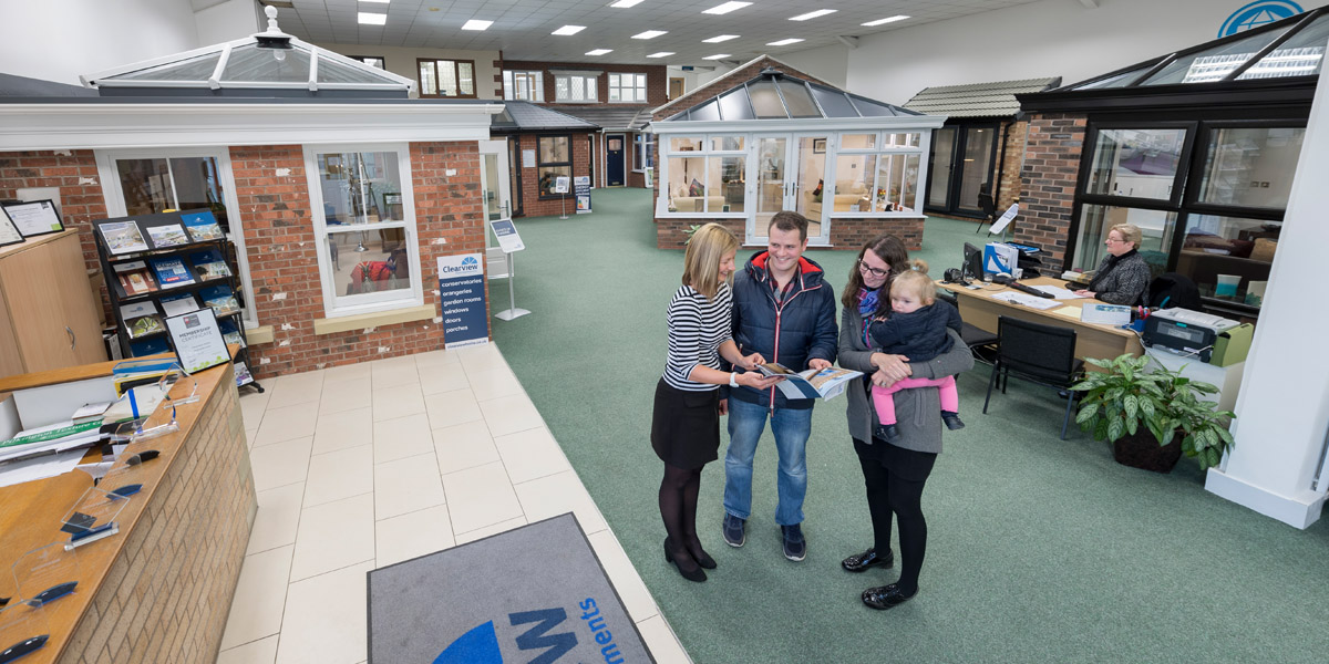 Customers being greeted in a Clearview showroom