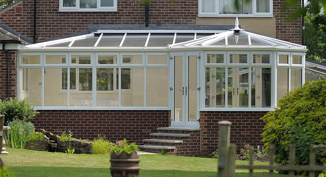The P-shape formation of this conservatory shows how it can be used as 2 spaces. 