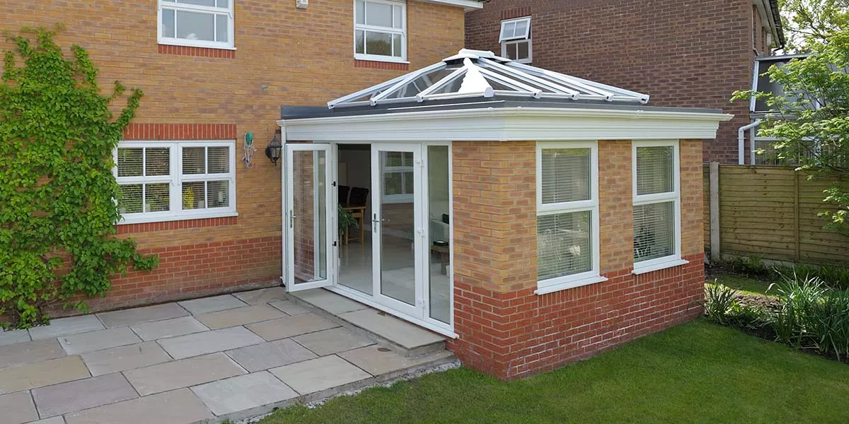 It's the brickwork in this orangery that separates it from a regular conservatory